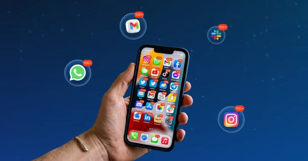 A hand holding an iPhone overwhelmed by hundreds of red notification bubbles from apps like WhatsApp, Gmail, Slack, and Instagram, illustrating app fatigue.